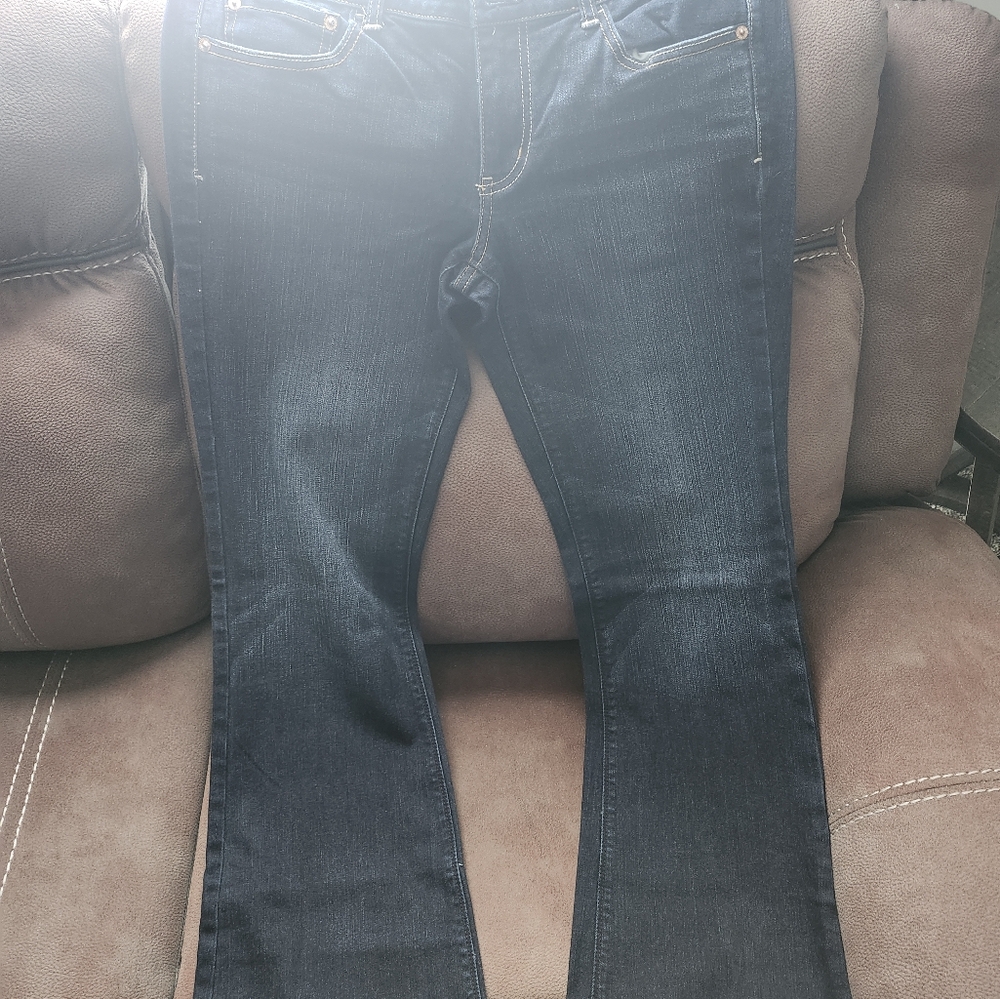 New without tags, American Eagle, dark wash women's artist flare leg jeans.